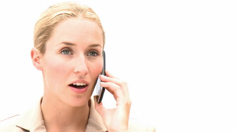 Businesswoman Engaging in Phone Conversation in Bright Space