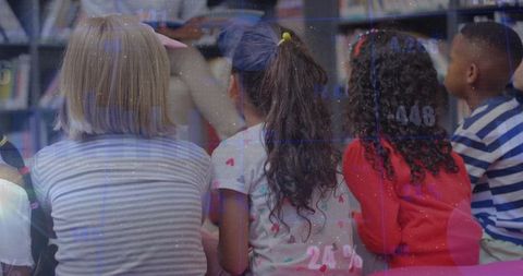 Diverse group of children enjoying storytime in classroom