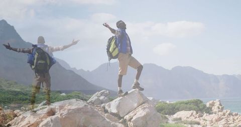 Joyful Adventurer Trekking in Mountainous Landscape