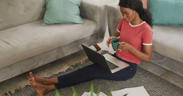 Happy African American Woman Using Laptop for Online Work at Home Office - Download Free Stock Images Pikwizard.com