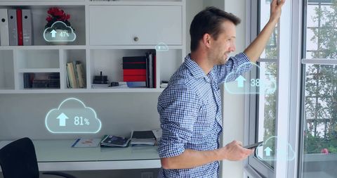 Man Using Smartphone with Data Interface Overlay