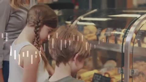 Children Exploring Pastry Selections in Local Bakery