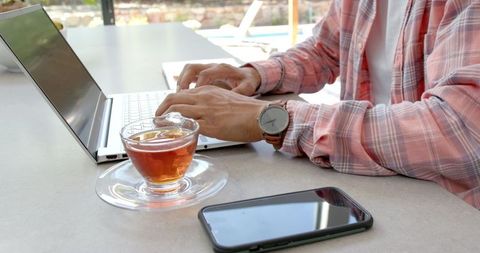 Productive Remote Working with Tea Break in Home Office