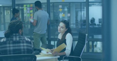 Modern office team collaboration meeting with documents