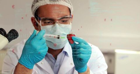 Scientist injecting strawberry with syringe in lab, wearing gloves mask goggles, biotech concept