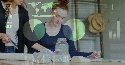 Business Professionals Analyzing Financial Data with Global Technology