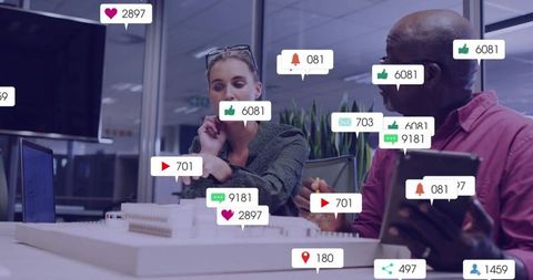 Collaborating over architectural model with social media notification overlay in office