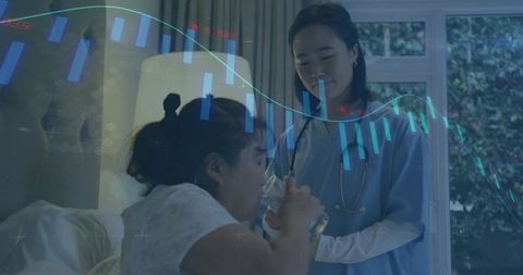 Healthcare Professional Caring for Patient with Financial Overlay