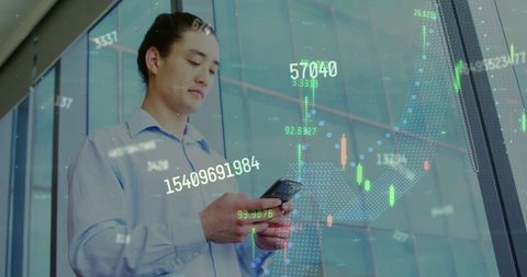 asian businessman engaged with financial data on smartphone - Download Free Stock Images Pikwizard.com