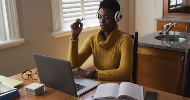 Focused Woman Studying Online with Laptop at Home - Download Free Stock Images Pikwizard.com