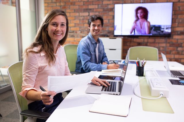 Happy Business Team in Modern Office During Video Conference - Download Free Stock Photos Pikwizard.com