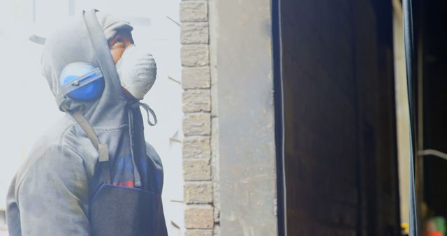 Worker Wearing Protective Gear in Industrial Environment - Download Free Stock Images Pikwizard.com