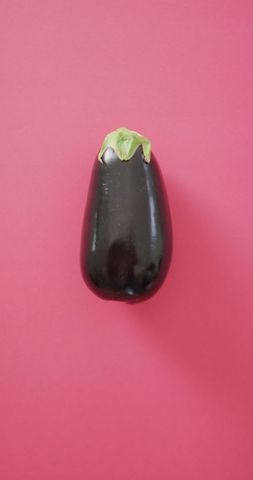 Single Fresh Eggplant on Pink Background - Download Free Stock Images Pikwizard.com
