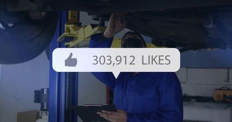 Female mechanic inspecting vehicle undercarriage on lift with social media like overlay