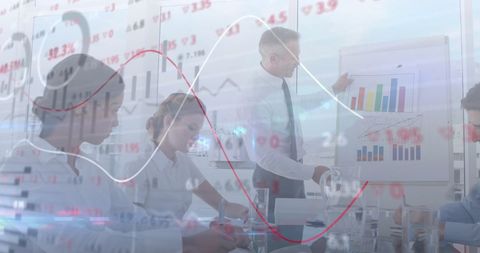 Business Team Analyzing Financial Data Trends in Office Meeting