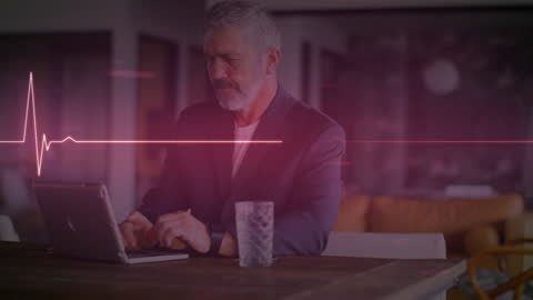 Senior Man Engaging with Health Technology Interface