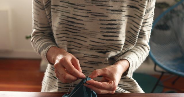 Person Focusing on Hand Sewing Fabric - Download Free Stock Images Pikwizard.com