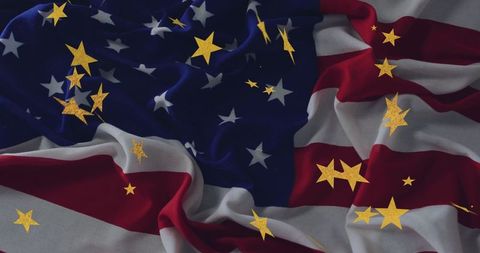 Crumpled American Flag with Gold Stars on Studio Table