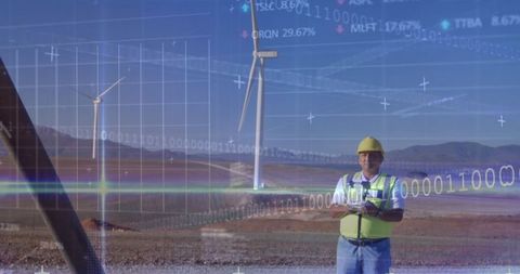 Engineer operates drone at wind farm with digital data overlay