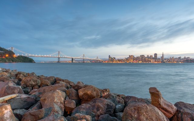 San Francisco Bay Bridge and City Skyline at Dusk - Download Free Stock Images Pikwizard.com