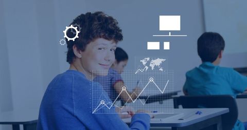 Caucasian Schoolboy Engaged with Digital Technology and Data in Classroom