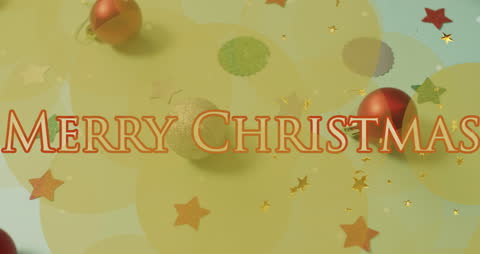 Merry Christmas Text with Holiday Decorations and Light Spots