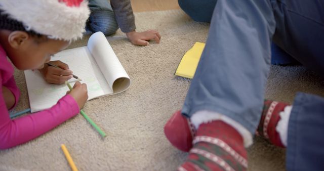 Children Drawing and Spending Time Together During Christmas Season - Download Free Stock Images Pikwizard.com