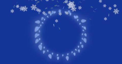 Snowflakes Falling Over Christmas Lights on Blue Background