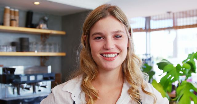 Smiling Female Barista in Modern Cafe - Download Free Stock Images Pikwizard.com