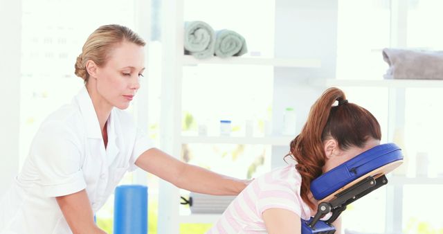 Professional Therapist Massaging Woman in Spa Setting - Download Free Stock Images Pikwizard.com