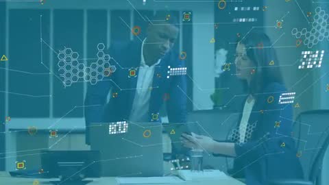 Business Professionals Analyzing Data with Modern Digital Graphics in Office