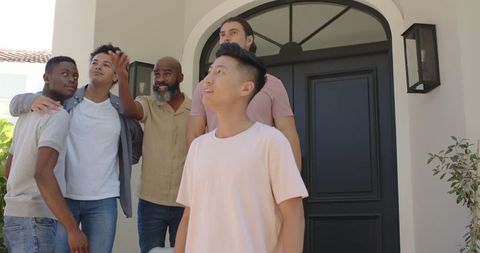 Friends Arriving at House for Wedding Celebration