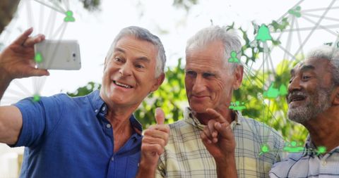 Senior Men Enjoying Technology with Digital Icons Overlay