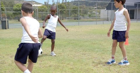 Children Playing Soccer During Physical Education Class