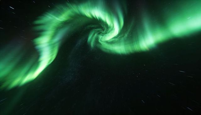 Spiral aurora borealis dancing across arctic night sky with emerald plasma ribbons