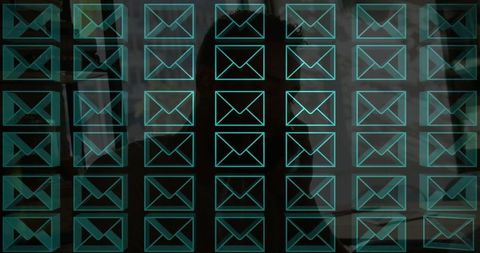 Digital message icons overlapped in office ambiance