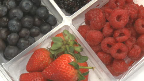 Fresh Berries Displayed in Clear Tray Compartment