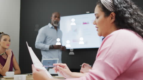 Diverse Team Meeting in Modern Office with Digital Technology