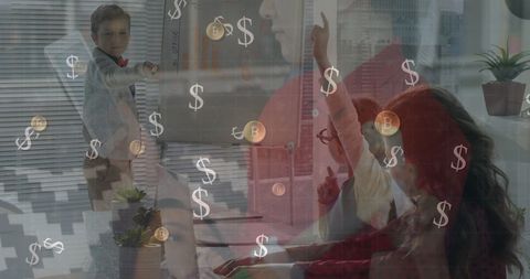 Children playing school with financial icons overlay