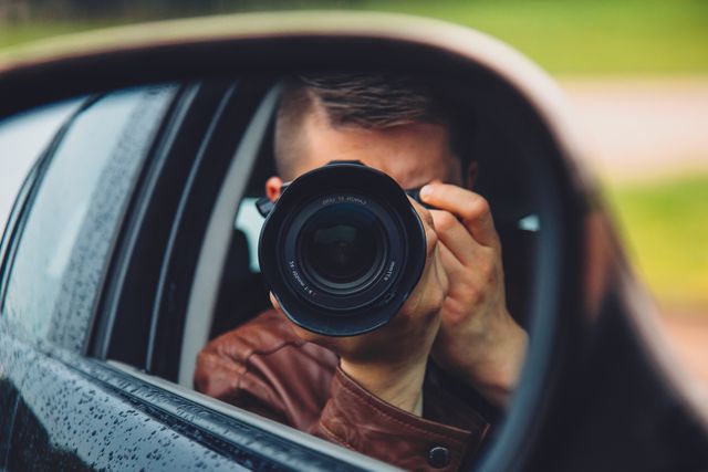 Photographer Capturing Scene Through Car Side Mirror - Download Free Stock Photos Pikwizard.com