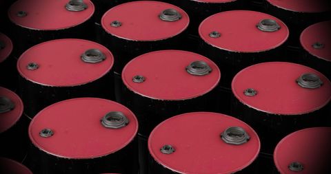 Top view of red industrial barrels for liquid storage