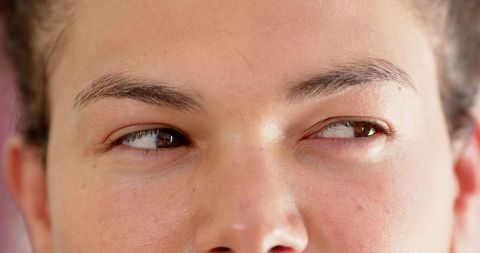 Close-Up of Woman Looking Sideways Showing Natural Skin Texture