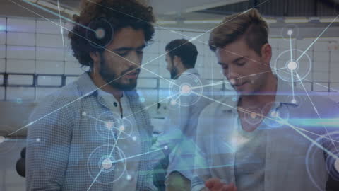 Diverse Businessmen Networking and Communicating in Modern Office