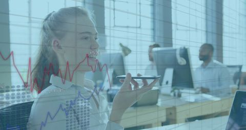 Businesswoman Working with Financial Data in Futuristic Office