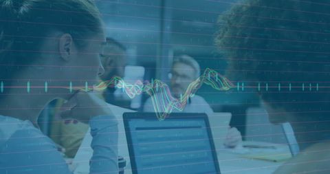 colleagues discussing work with financial data graphics overlay - Download Free Stock Images Pikwizard.com
