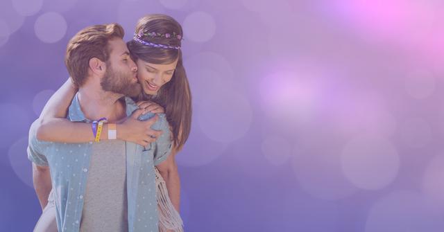 Young affectionate couple enjoying a playful moment and celebrating their love. The man is giving a piggyback ride to the woman while gently kissing her on the cheek, set against a dreamy purple background with bokeh lights. Ideal for use in advertisements, blog posts, and social media campaigns related to love, relationships, and special moments.