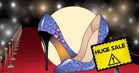 Stylish blue leopard high heels on red carpet