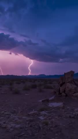 Forked Lightning Striking Desert Plain under Shelf Cloud at Dusk | Vertical Storm Footage