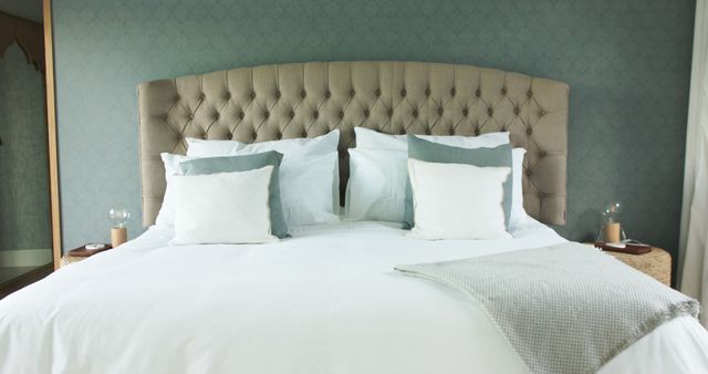 Luxurious Bedroom Interior with Plush Upholstered Headboard and Stylish Bedding - Download Free Stock Images Pikwizard.com