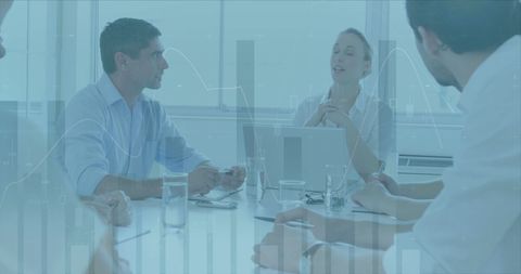 Diverse Business Professionals Meeting for Financial Data Analysis